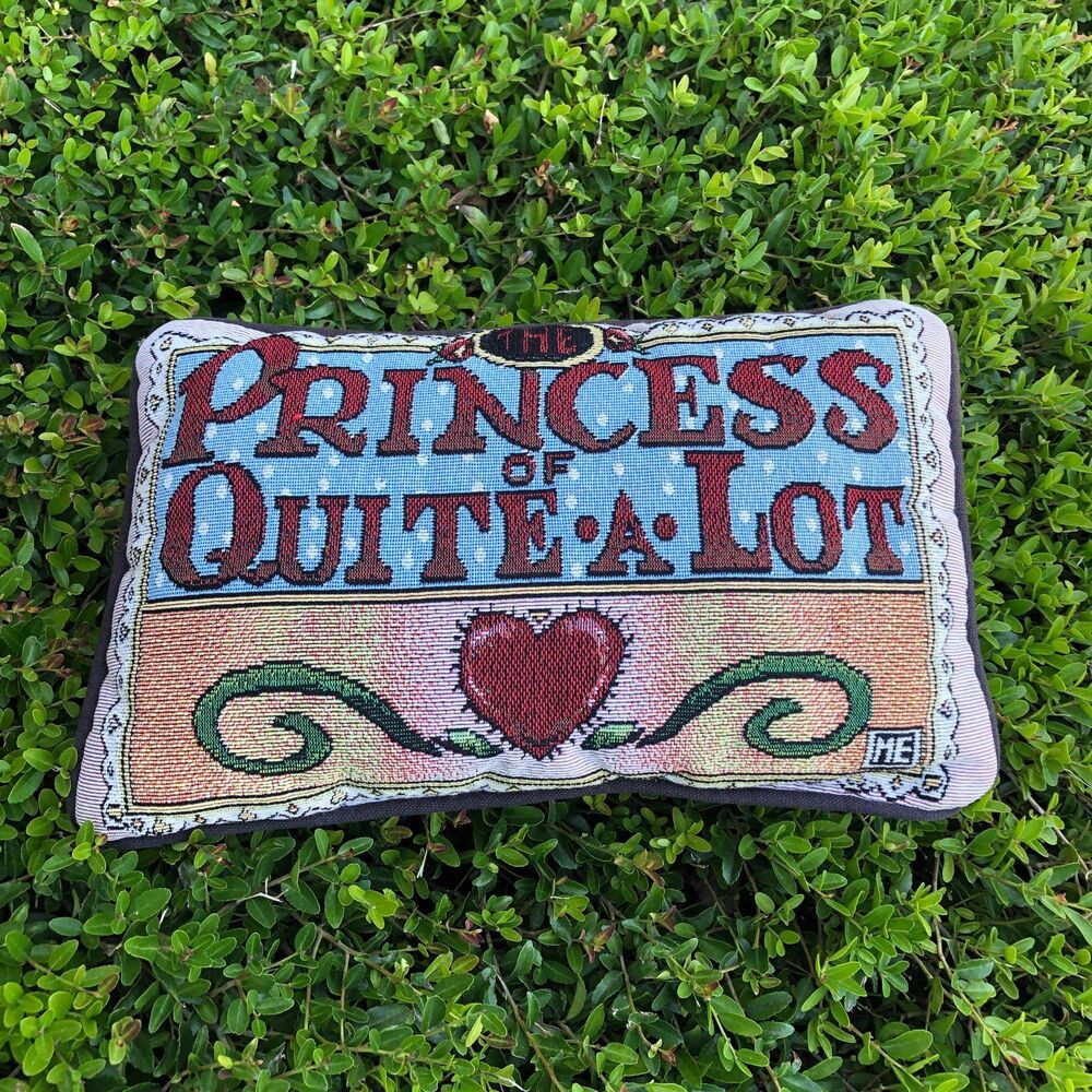 Mary Engelbreit "The Princess Of Quite A Lot" Tapestry Throw Pillow 11" × 7.25